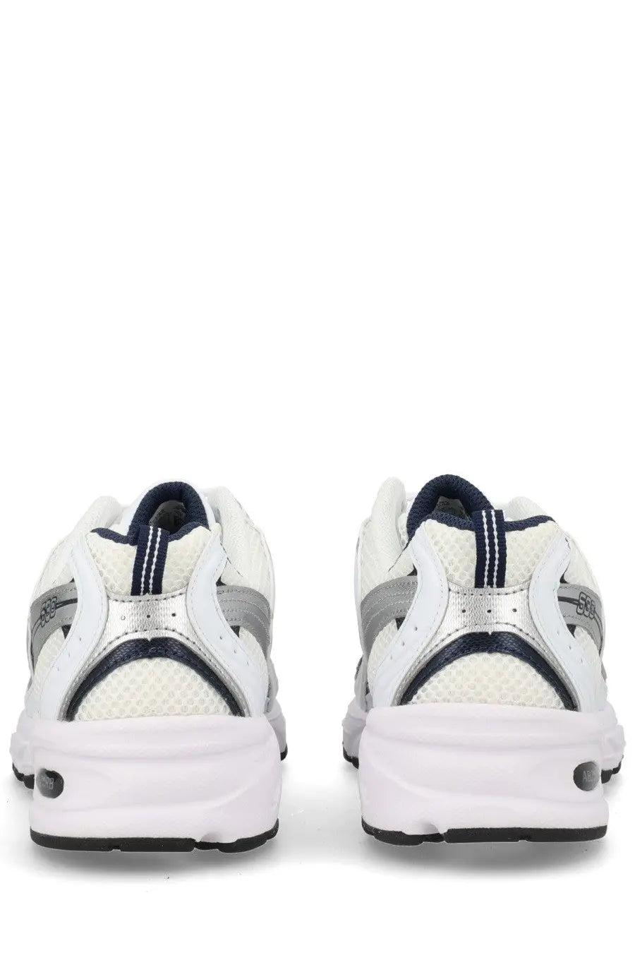 New Balance unisex sneaker white with white and silver mesh upper navy blue accents and durable rubber sole