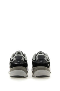 New balance women’s sneaker 990v6 black with black and gray textured mesh upper and rubber outsole
