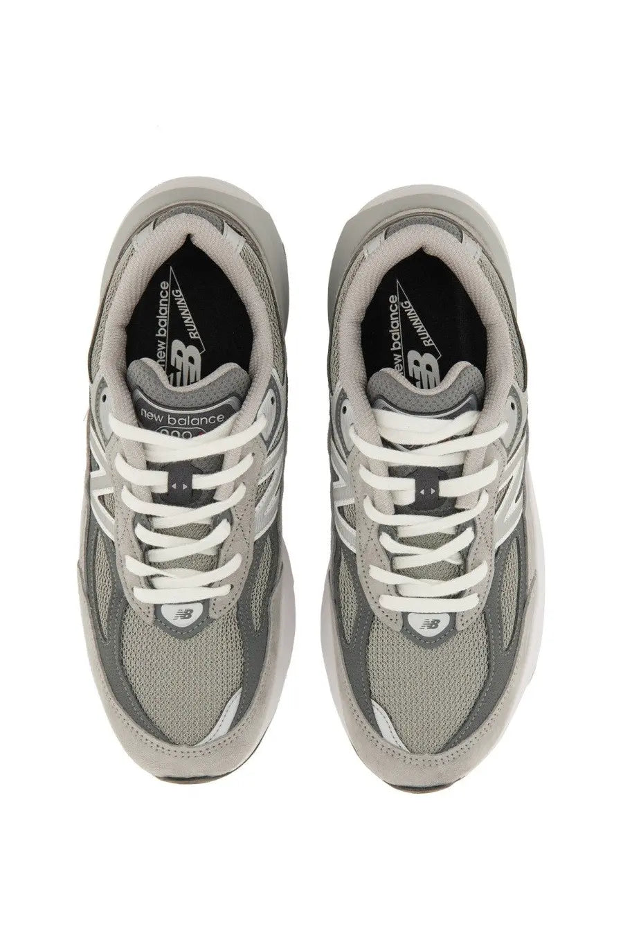New balance women’s sneaker grey featuring gray 990v3 running shoes with white laces and mesh upper material