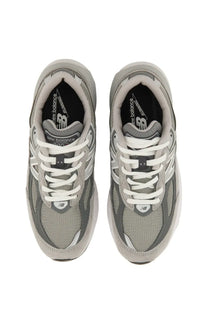 New balance women’s sneaker grey featuring gray 990v3 running shoes with white laces and mesh upper material