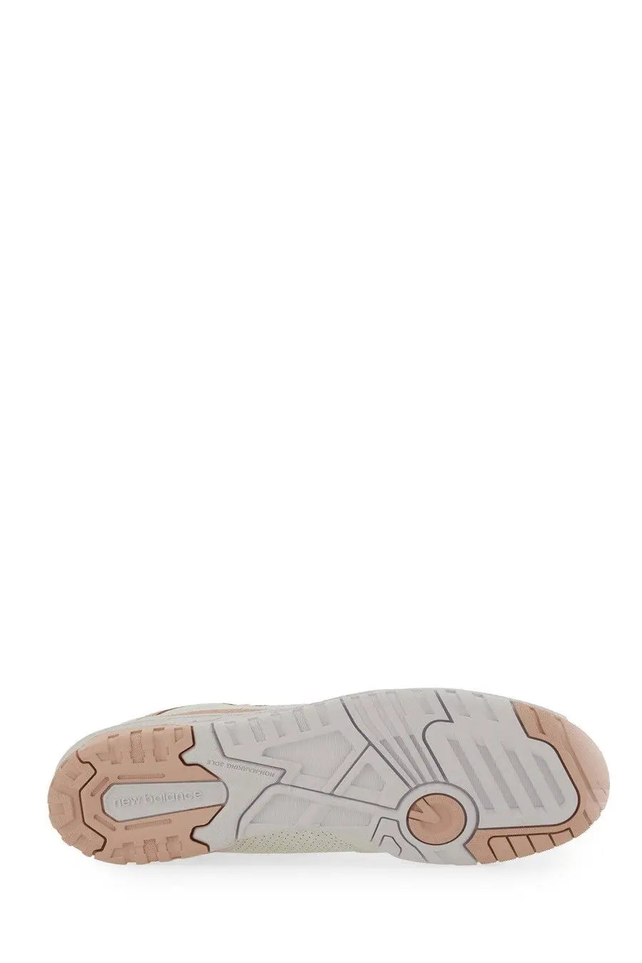 Beige and light gray rubber sole with textured tread on new balance women’s sneaker white