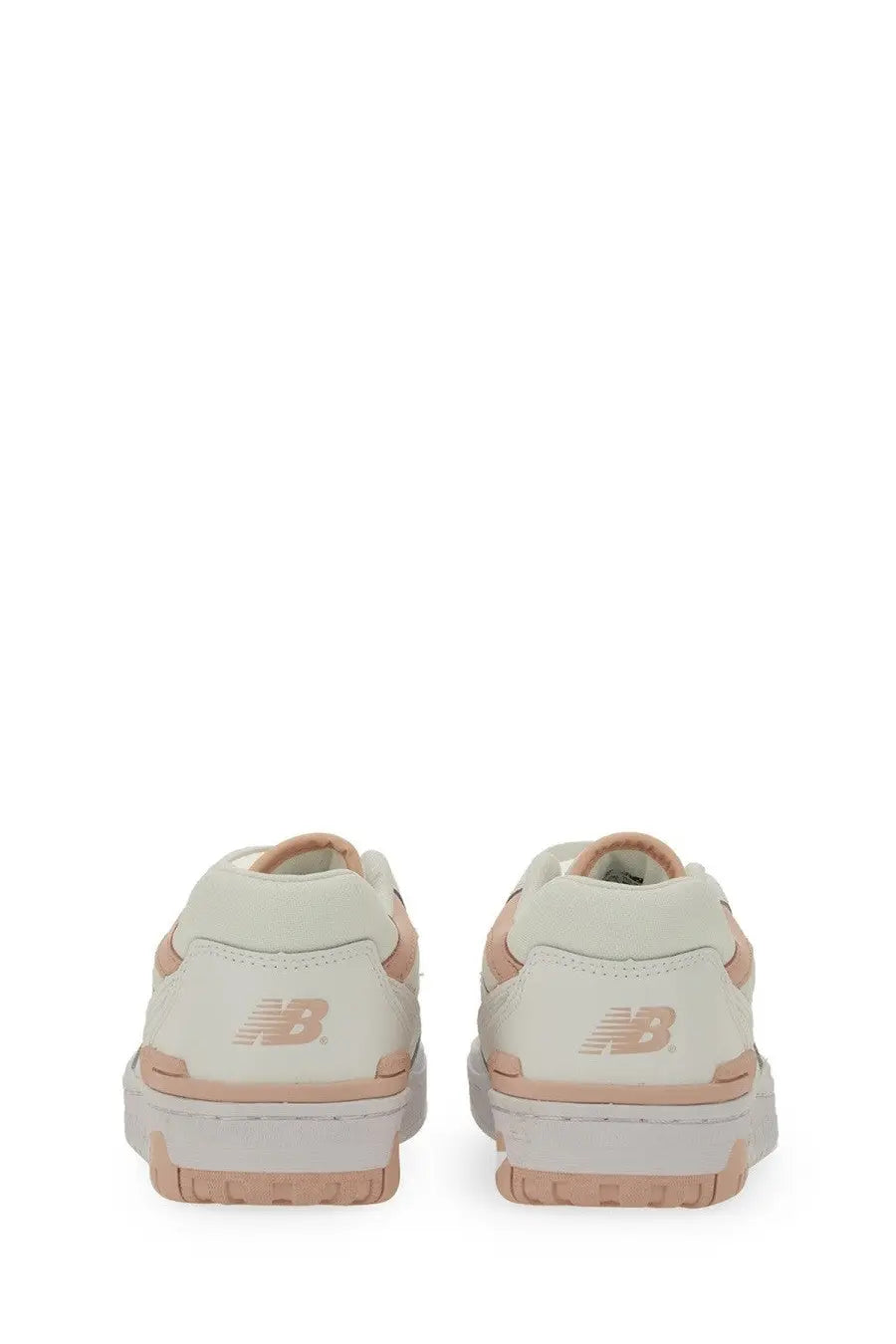 New Balance women’s sneaker white in cream with blush pink accents and chunky white sole for casual wear