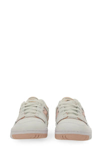 New Balance women’s sneaker white with white and rose gold minimalist design and lightweight breathable materials