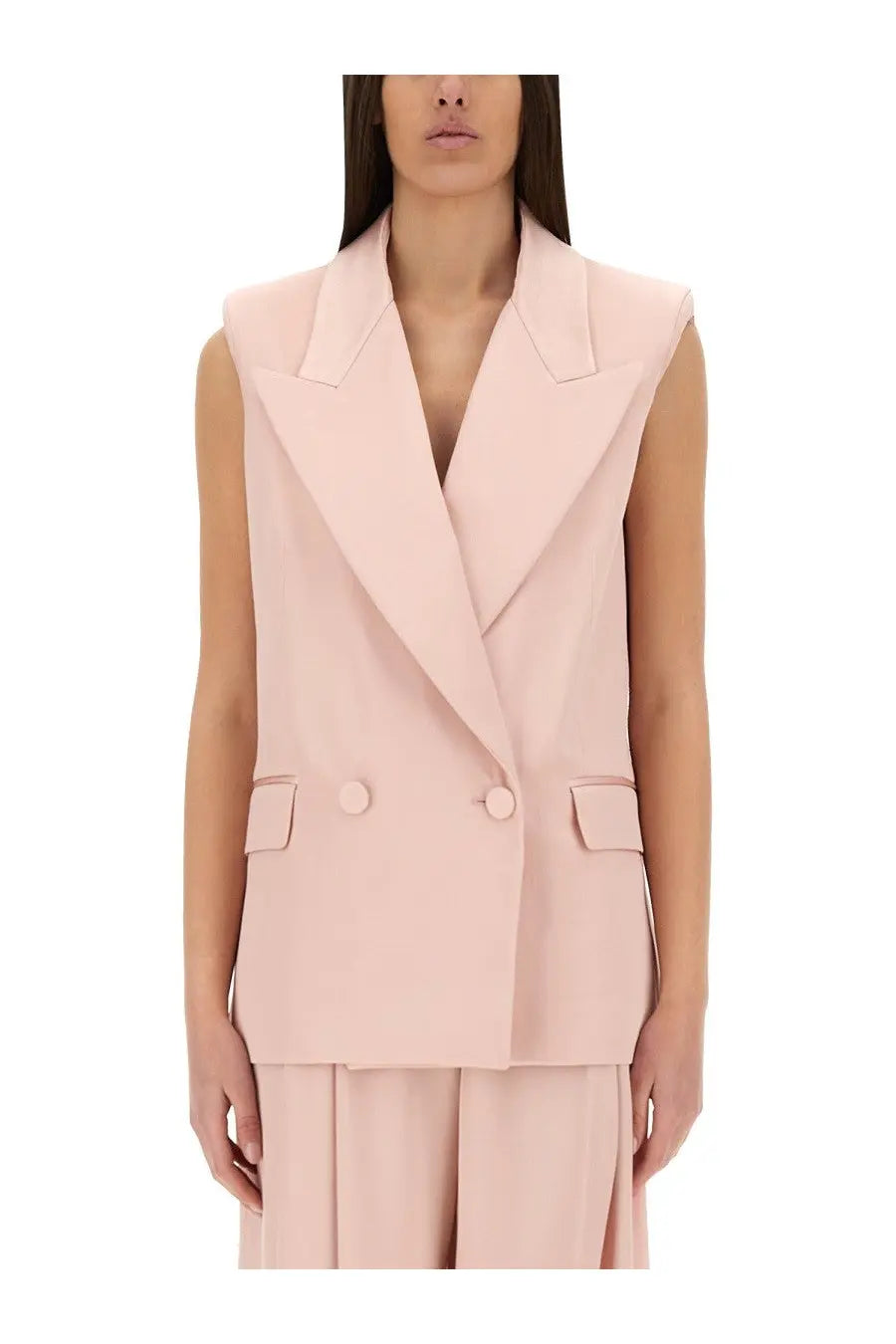 Nina Ricci women’s soft pink sleeveless double breasted blazer with structured design and matching buttons