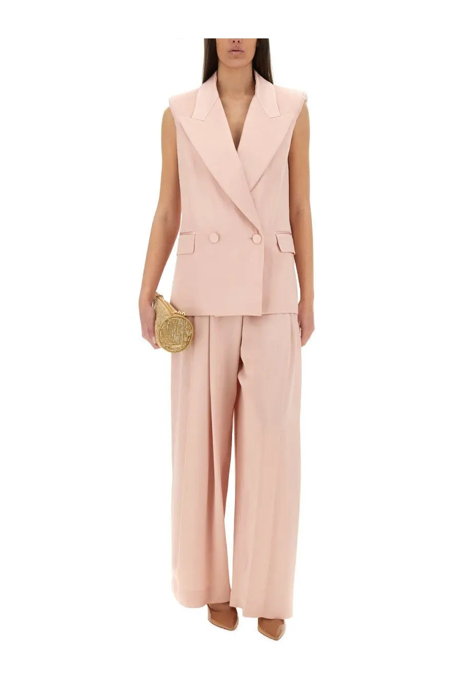 A soft pink sleeveless double breasted blazer with notched lapels by Nina Ricci womens jacket