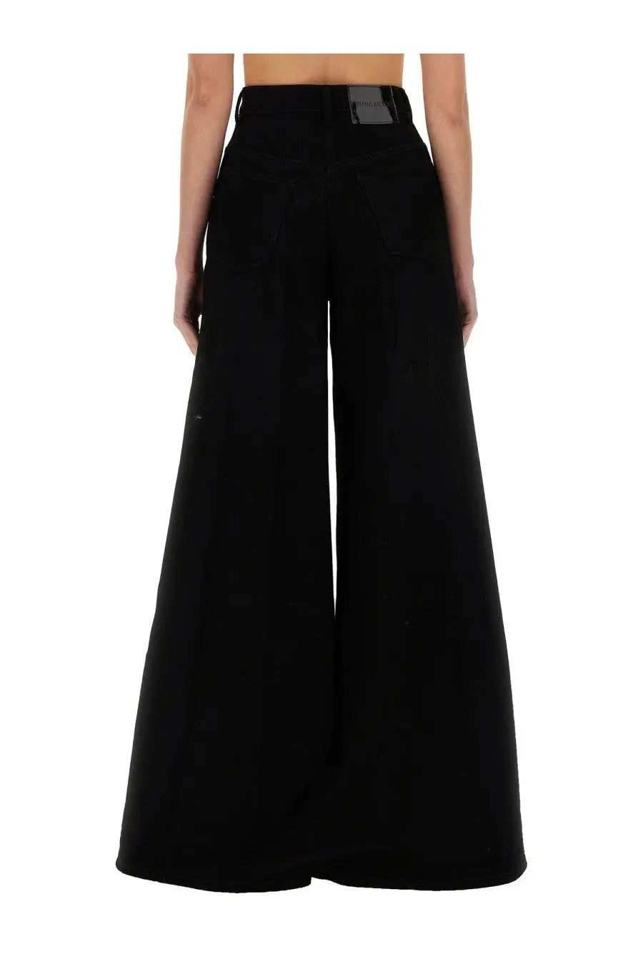 Black high-waisted wide-leg tailored trousers with subtle brand label at waistband by nina ricci womens flared pants