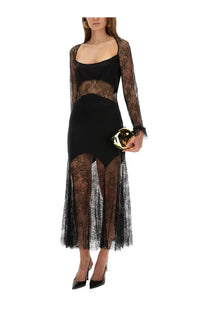 Nina Ricci women’s long black lace dress with sheer long sleeves and fitted bodice for elegant occasions