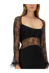 Nina Ricci women’s black long lace dress featuring a black lace overlay top with sheer long sleeves and a square neckline
