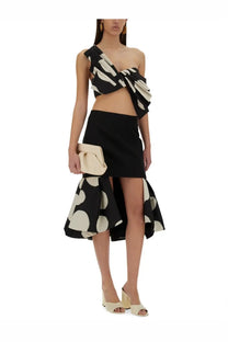Nina Ricci women’s black and cream polka-dot midi skirt with asymmetrical high slit detail