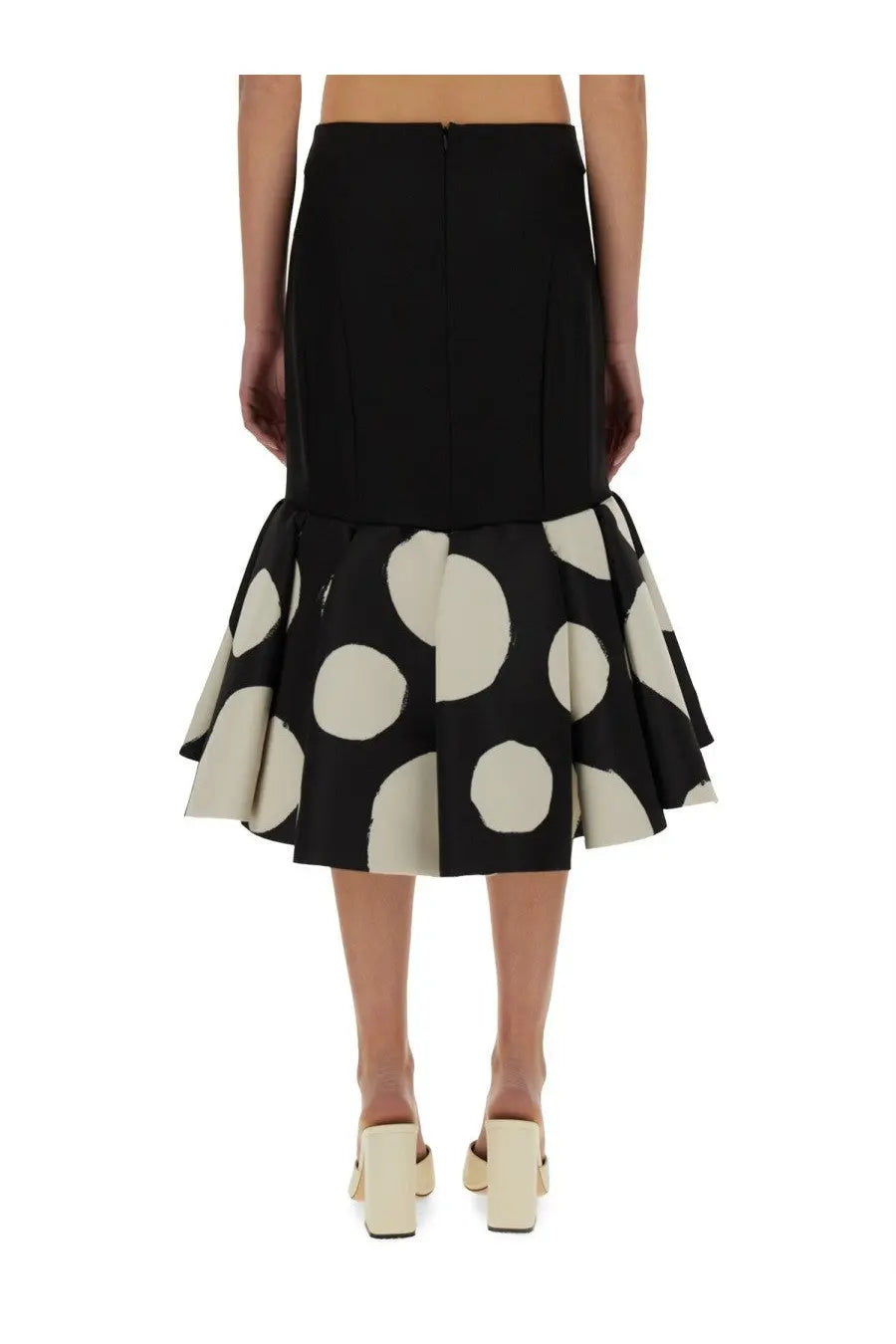 Nina Ricci women’s black midi skirt with cream polka dots and a structured waistband in mermaid style