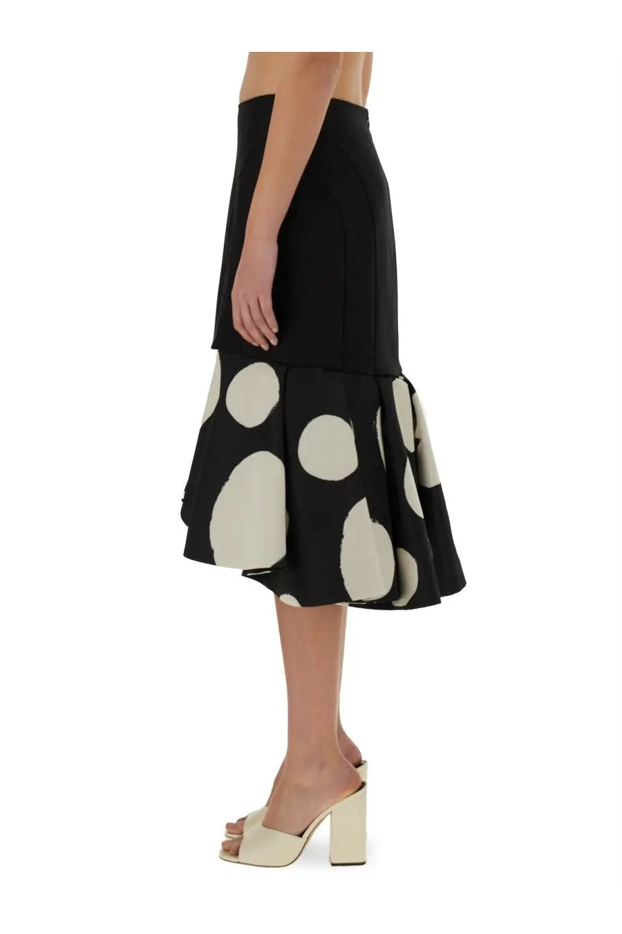 Nina Ricci women’s black midi skirt with flared asymmetrical hem and large off-white polka dots