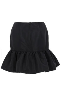 Black mini skirt with flared ruffle hem and central back zipper shown from the back by nina ricci women