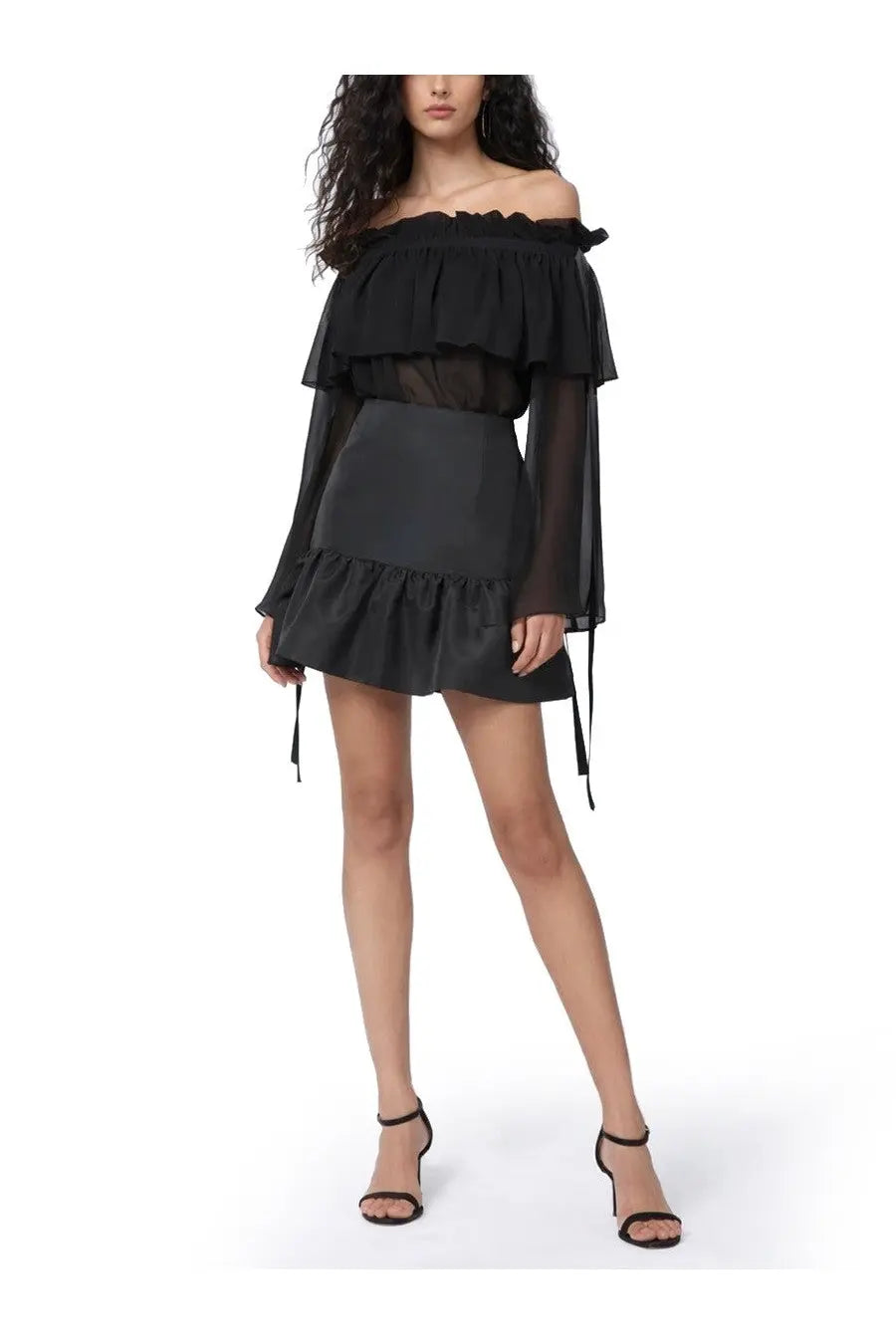 Black off-the-shoulder ruffled top with sheer long sleeves and matching mini peplum skirt by Nina Ricci