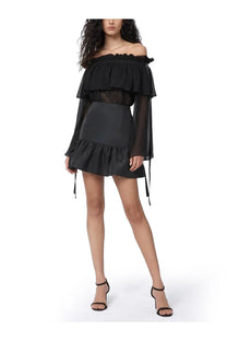 Black off-the-shoulder ruffled top with sheer long sleeves and matching mini peplum skirt by Nina Ricci