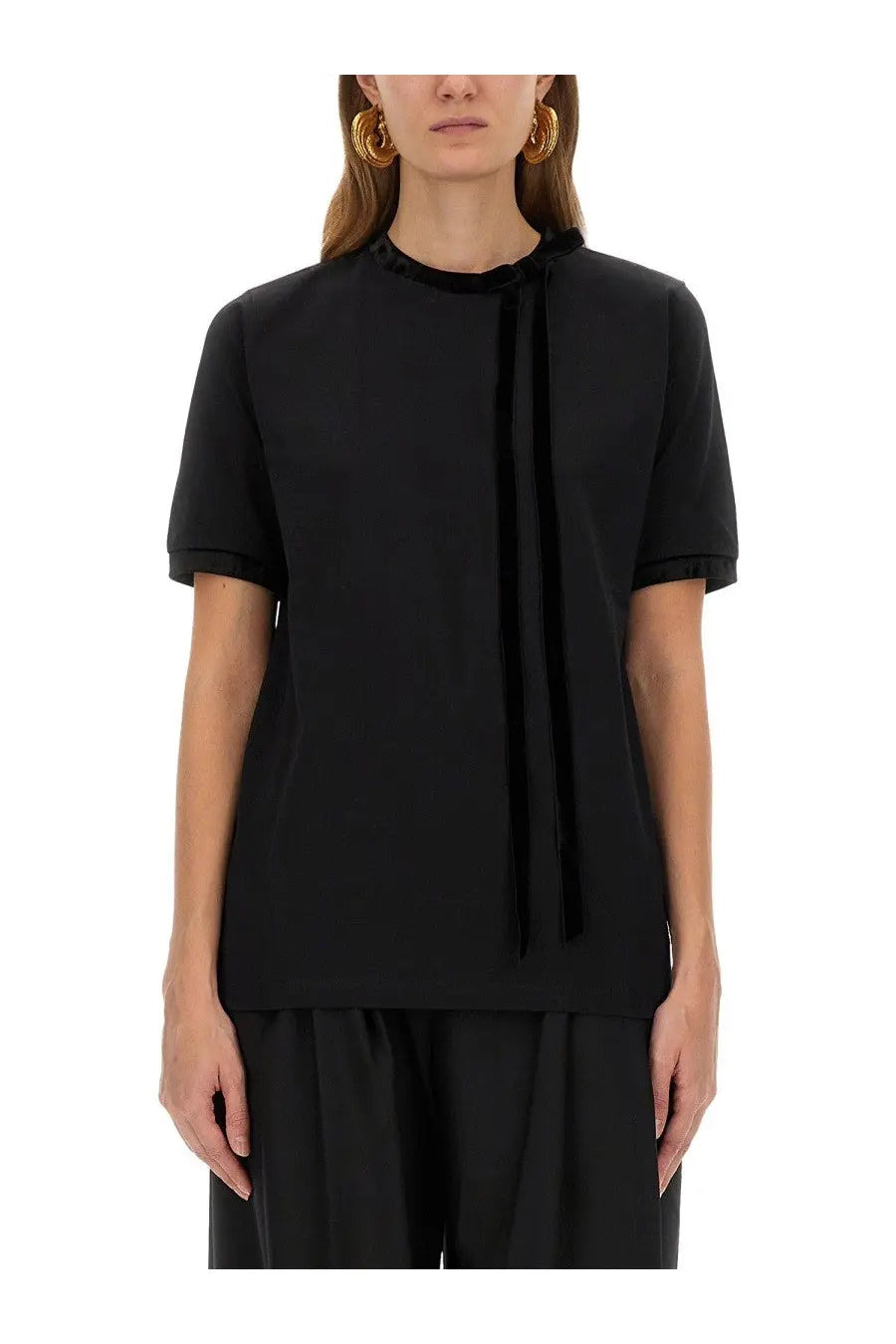 Nina Ricci women’s black short-sleeved shirt with velvet tie detail at the neckline in soft fabric