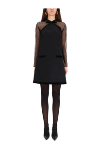 Nina Ricci women’s short sleeveless black dress with sheer polka-dot sleeves and velvet-trimmed neckline