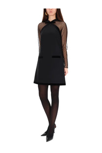 Nina Ricci women’s black short sleeveless dress with sheer polka dot sleeves and velvet trim