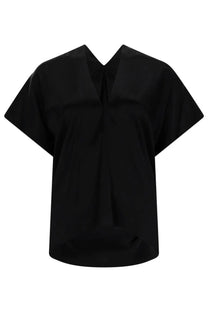 Black satin blouse by nina ricci with v-neck and short wide sleeves in silk material