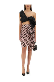 Black one-shoulder ruffled crop top with draped asymmetrical design paired with nina ricci womens blue skirt