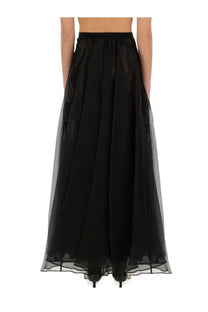 Nina Ricci women’s black sheer tulle maxi skirt with high-waisted elastic band and layered flowing hem