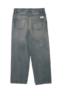 Back view of nineinthe morning men’s dark gray denim loose fit jeans with classic back pockets
