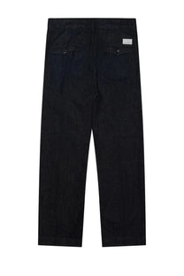 Back view of nineinthe morning men’s dark indigo denim chino trousers with patch pockets and white label on right pocket
