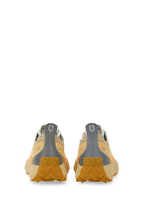 Pair of Norda men’s Conder Dyneema trail running shoes in tan and gray with rugged textured sole in yellow