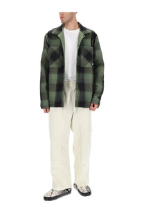 The North Face men’s Afterburner flannel jacket in olive and black plaid with collar and chest pockets