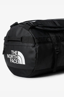 Black The North Face men’s Base Camp duffel bag with white logo and reinforced straps made from recycled PVC