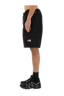 The North Face men’s black cargo shorts with side pockets and white logo on the left thigh