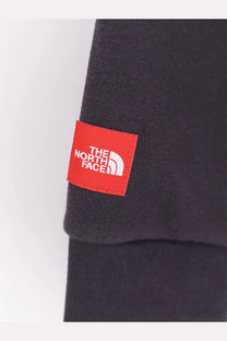 Black cotton sweatshirt sleeve with red the north face label featuring white logo and mountain emblem