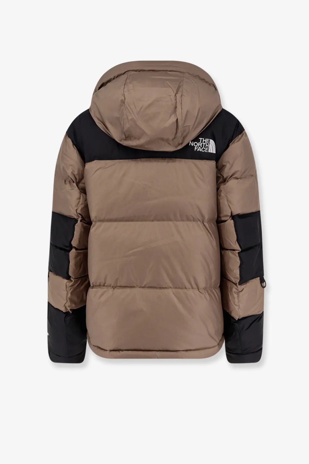 The north face men’s Himalayan brown nylon down jacket features a tan and black quilted puffer design with logo hood