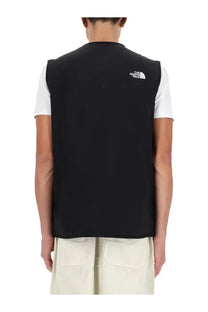 Black the north face men’s ilti liner vest in black showing back side with white logo on upper back