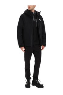The North Face men’s black jacket with a hood and zipper closure designed for outdoor use