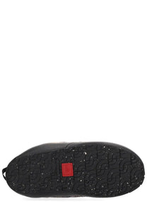 The north face men’s mule shoe thermoball grey showing black rubber sole with textured pattern and red logo patch