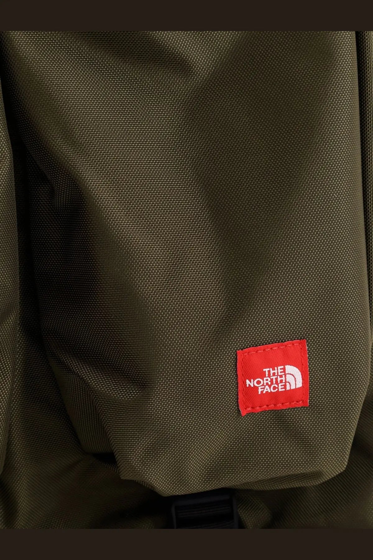 Olive green nylon backpack with red embroidered logo patch from the north face men’s nylon handbag beige collection