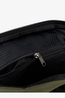 The north face men’s beige nylon shoulder bag with black mesh-lined interior and black zipper with metallic pull tab