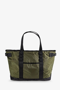 The north face men’s nylon shoulder bag in beige features olive green and black utility tote design with reinforced straps and front pocket