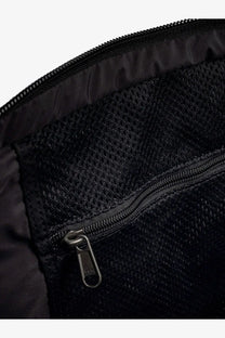 The North Face men’s black nylon shoulder bag interior with black mesh lining zipper and pull tab visible