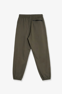 The north face men’s nylon trousers in olive green feature an elastic waistband and black zipper pocket for comfort
