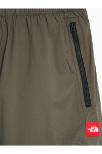 The north face men’s olive green nylon shorts with a black zipper pocket and red brand patch front view
