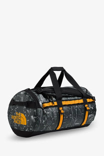 The North Face men’s recycled PVC base camp duffel backpack grey with dark gray exterior and orange strap accents