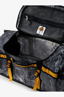 Gray the north face men’s recycled pvc base camp duffel backpack with map pattern yellow straps and black mesh lining
