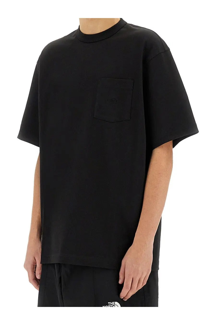 The North Face men’s relaxed fit black short-sleeved cotton t-shirt with crew neck and chest pocket logo