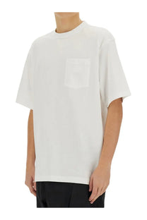 The north face men’s relaxed fit white oversized short-sleeved t-shirt with single chest pocket