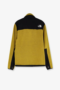 The North Face men’s Retro Denali jacket features a mustard-yellow and black fleece color-block design