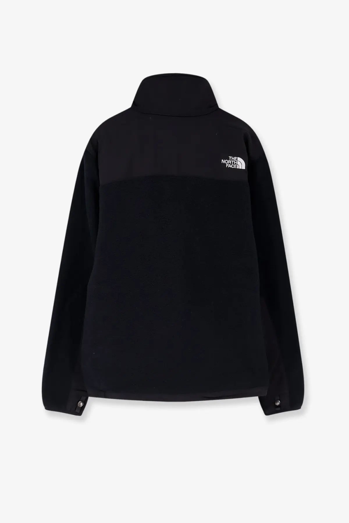 Black the north face men’s retro denali jacket showing the back with white logo on upper back in black fleece material