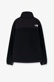 Black the north face men’s retro denali jacket showing the back with white logo on upper back in black fleece material