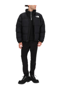 The north face men’s retro nuptse jacket black puffer jacket with quilted design and white logo on the chest