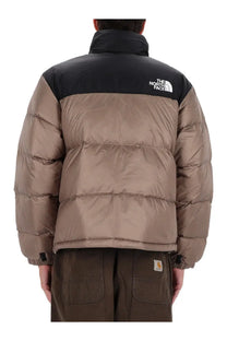 The north face men’s retro nuptse jacket brown shown from the back with tan puffer body and black collar and shoulder panels